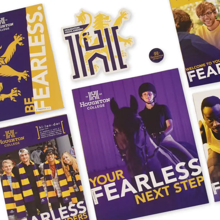 A flatlay of Houghton University Admission "Fearless" campaign materials